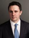 An image of Mr Andrew Hirst wearing a dark suit.